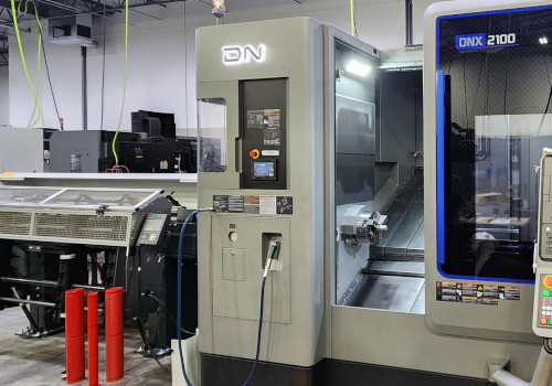 Mill-turn CNC machine supporting rapid prototyping and machining